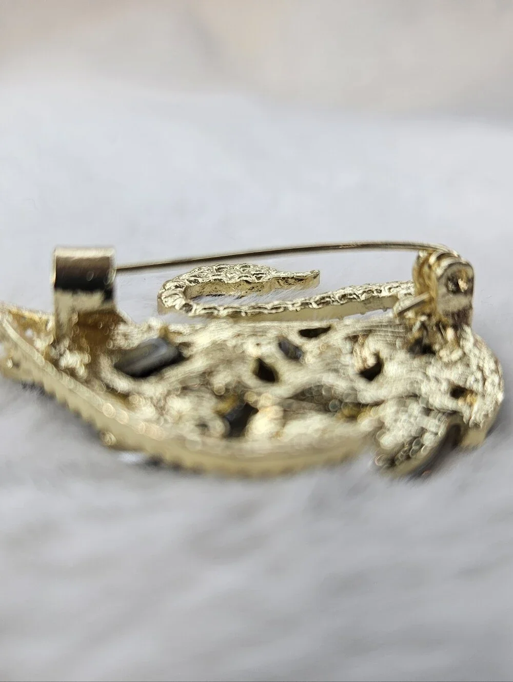 Gold-Tone Swan Brooch with Burgundy and Champagne Crystals